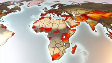 Une carte du monde avec des zones marquées en rouge pour indiquer les régions à risque.